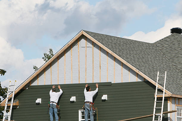 Professional Siding technician working in Cold Spring Harbor, NY